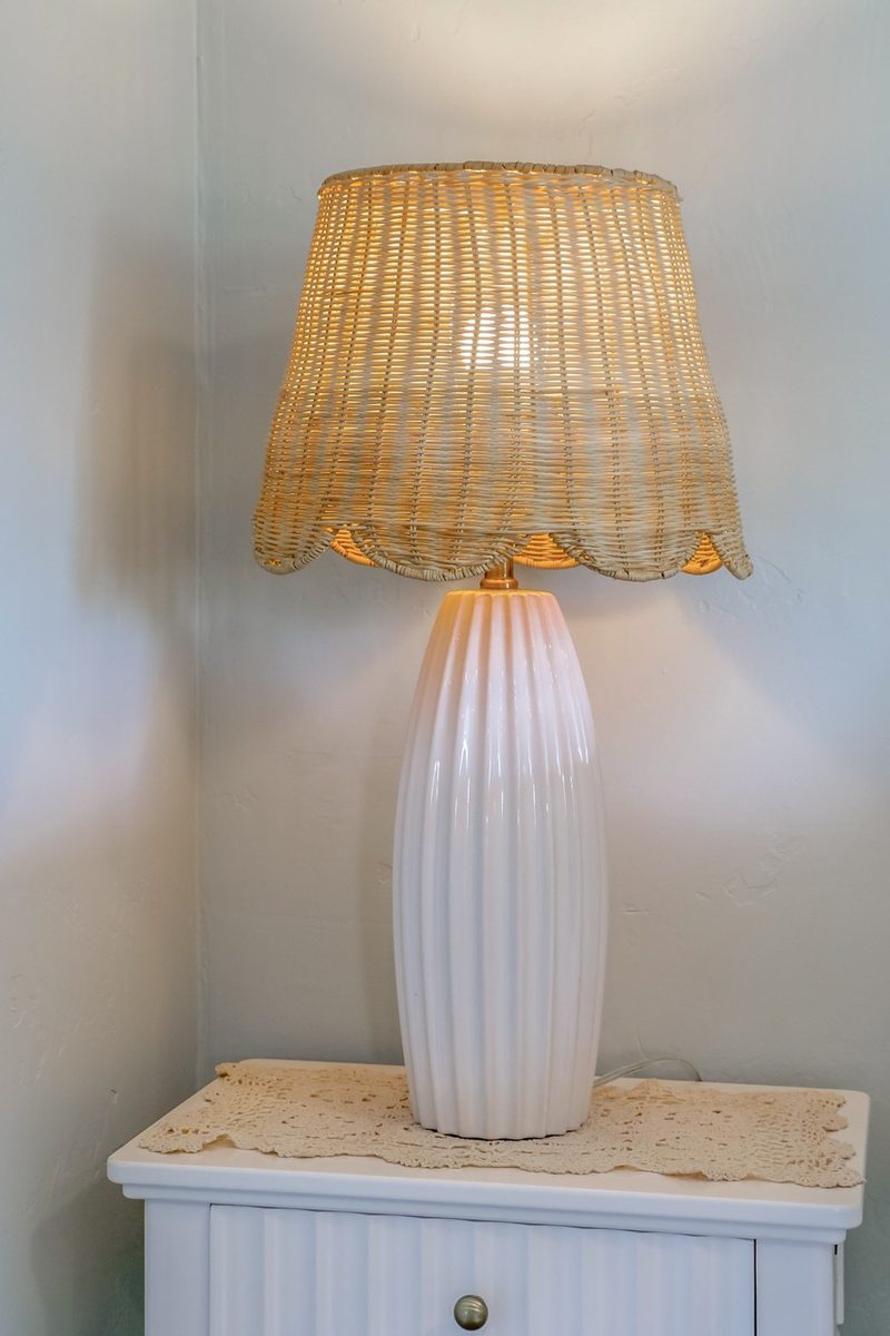 Scalloped rattan table lamp, by KDC Interiors