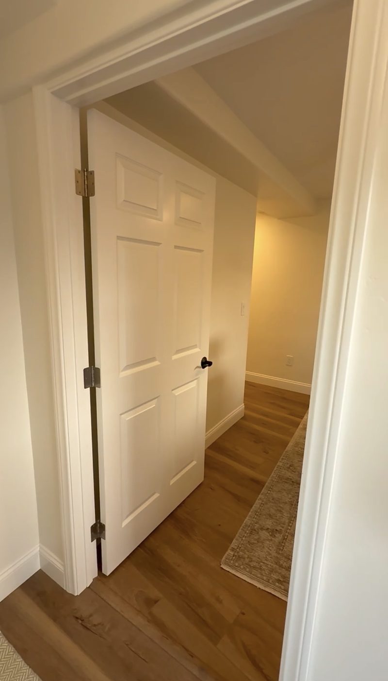 After: the new interior door connecting the office and laundry to the main living area, by KDC Interiors