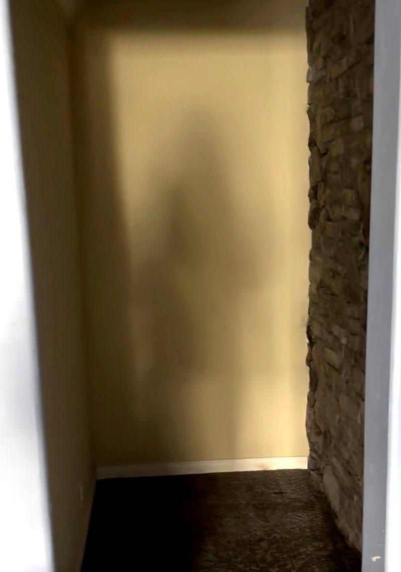Before: the doorway to the main living area, closed off and unused