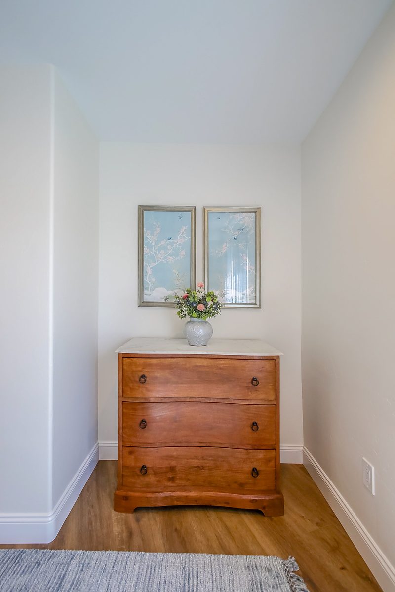 Dresser nook styled with botanical prints, by KDC Interiors